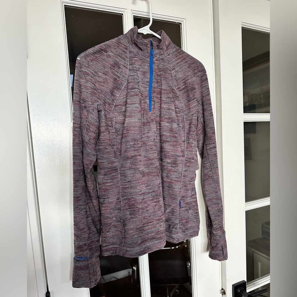 Rulu 1/2 zip Run top. Full length. Like new. Only worn casually a few times.